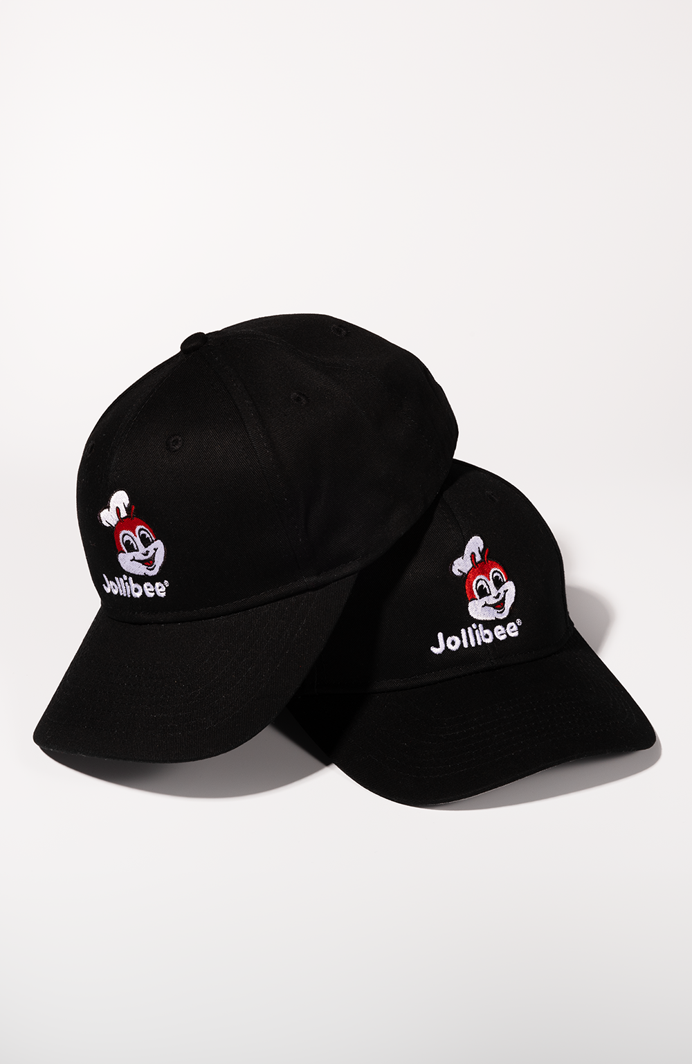 two Jollibee black baseball caps