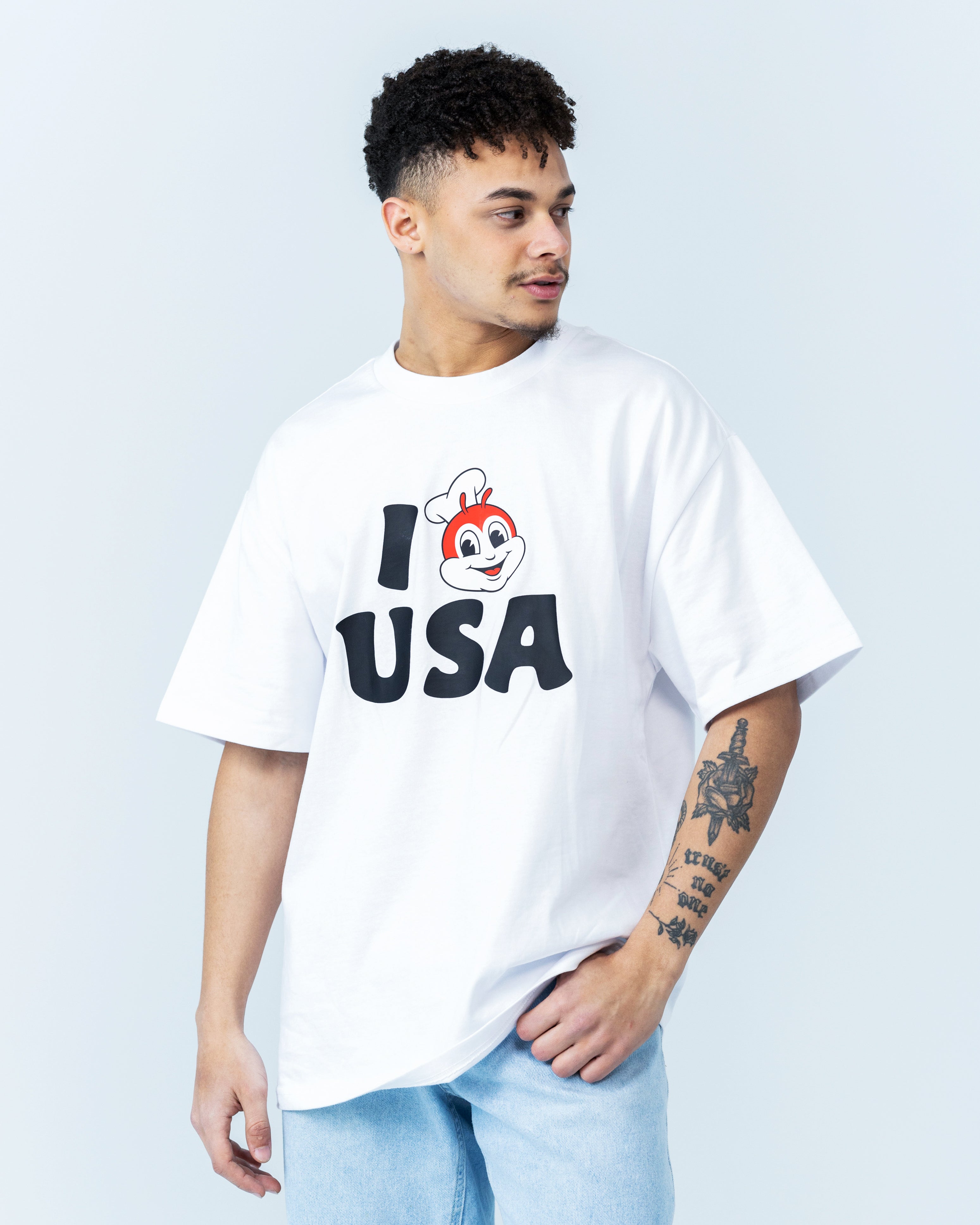 guy wearing the I JB USA white shirt
