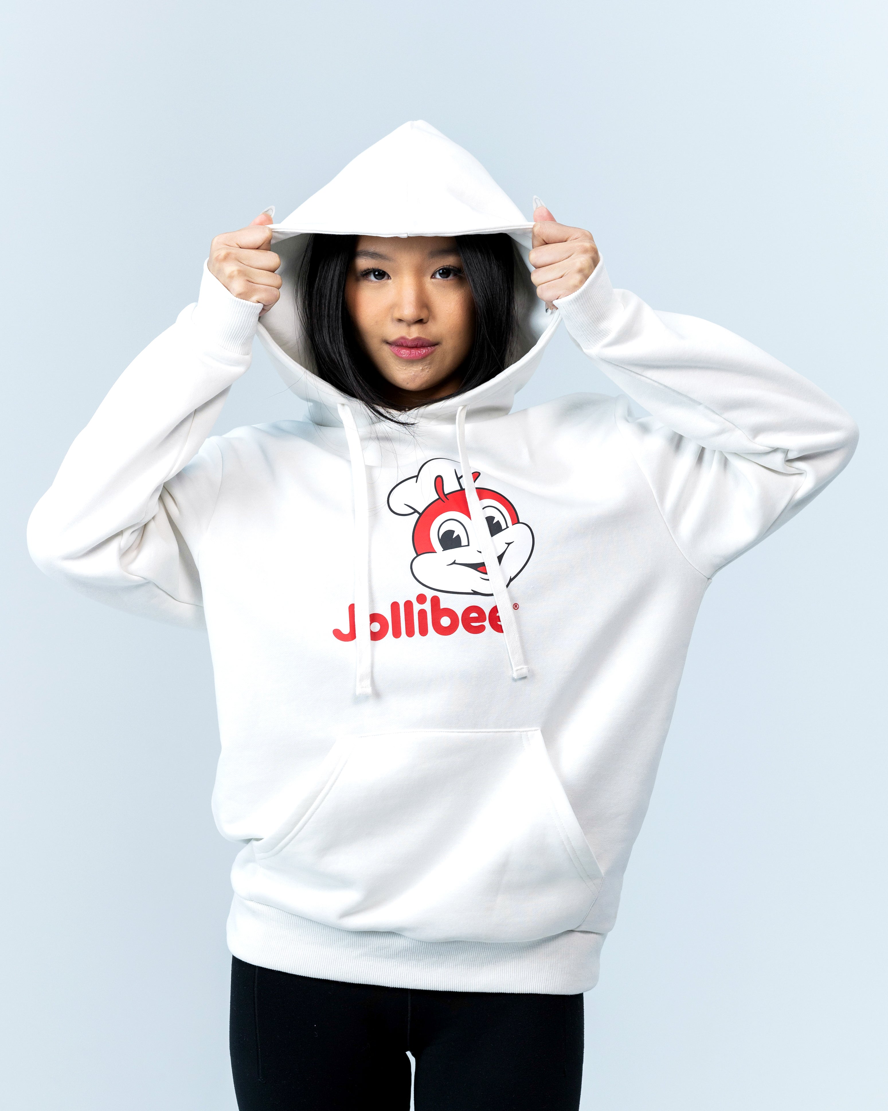 girl wearing Jollibee merch classic white hoodie