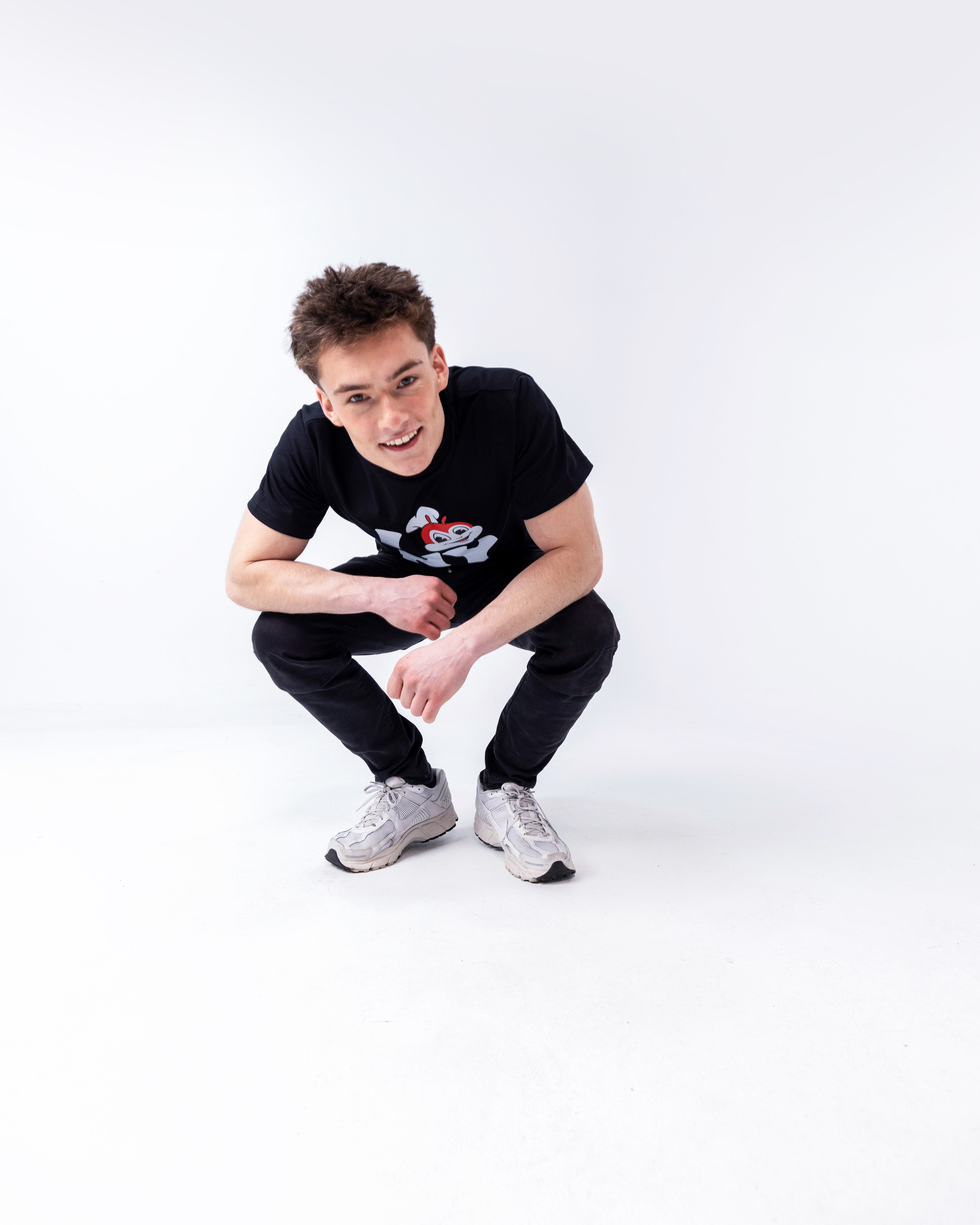 guy wearing Jollibee merch I JB NY black t-shirt