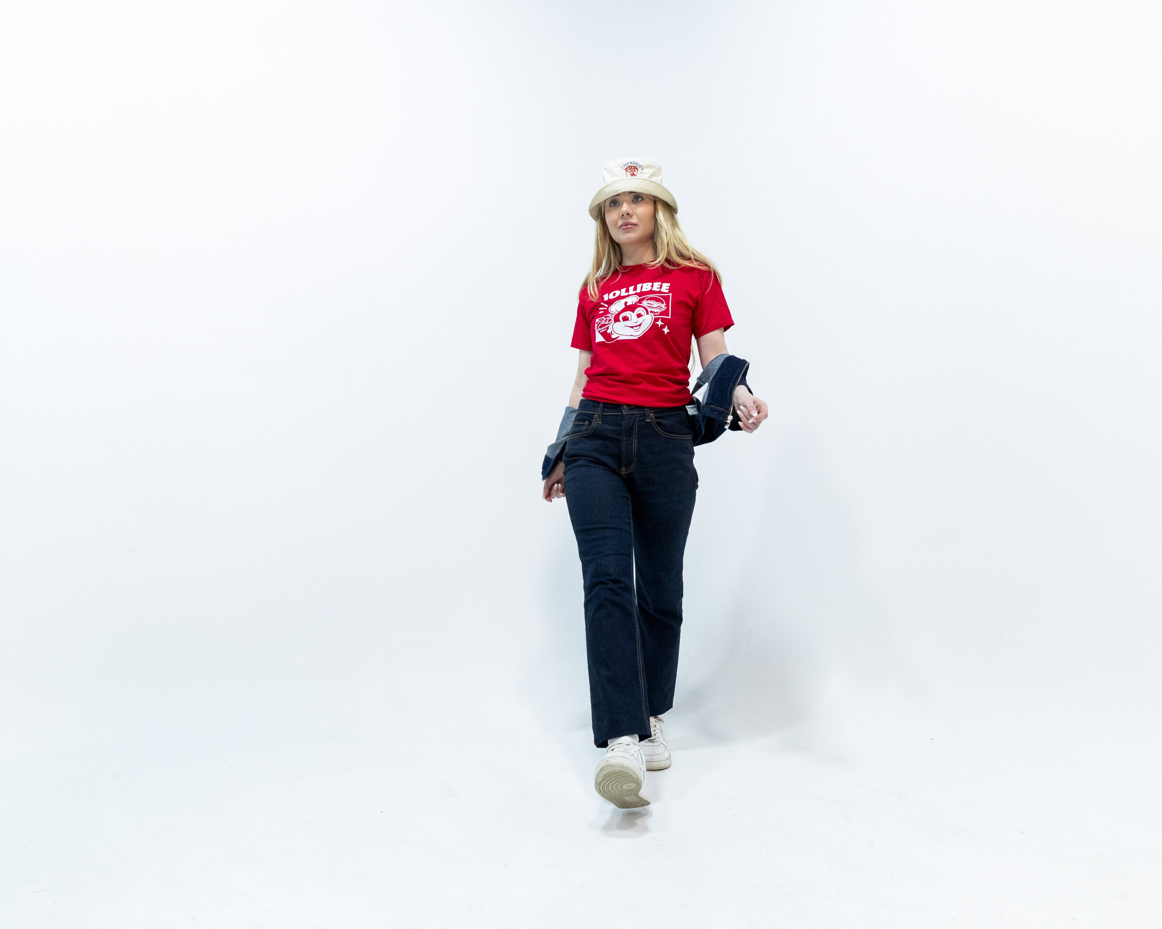 girl wearing Jollibee merch retro red t-shirt and bucket hat