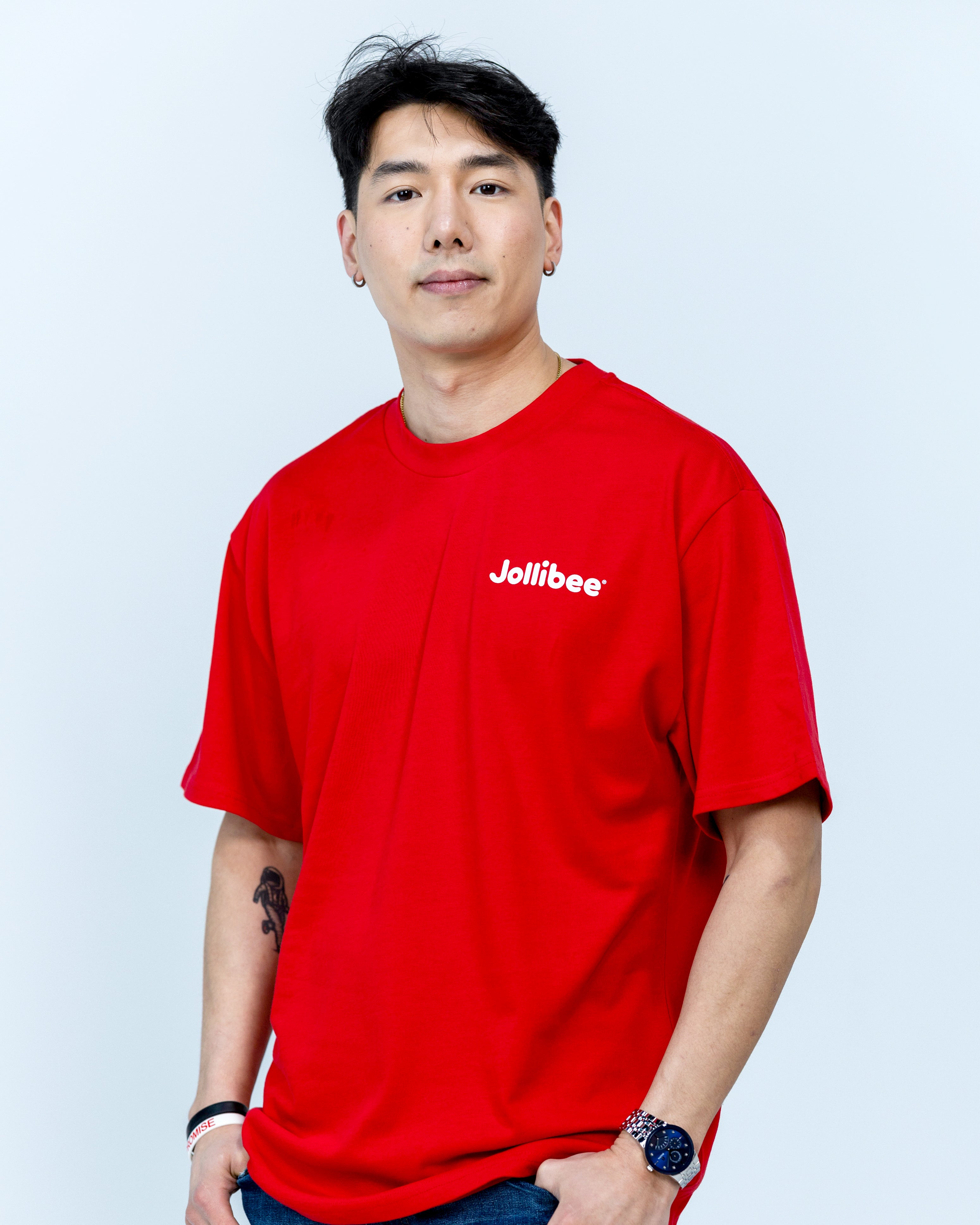 guy wearing Jollibee merch retro red t-shirt
