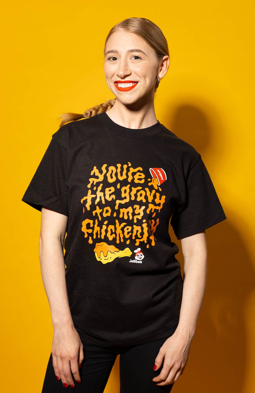 young woman wearing a Jollibee Black Gravy T-Shirt